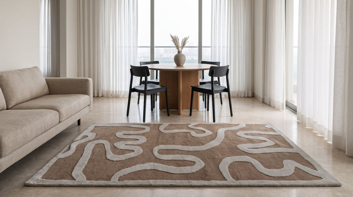Congrand Wool Rug in a living room, hand tufted New Zealand wool with ivory curves on camel.