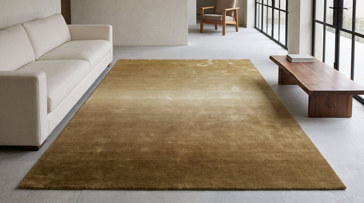 Ombré rug in a styled living room, hand tufted New Zealand wool in a slow gradation of tone.