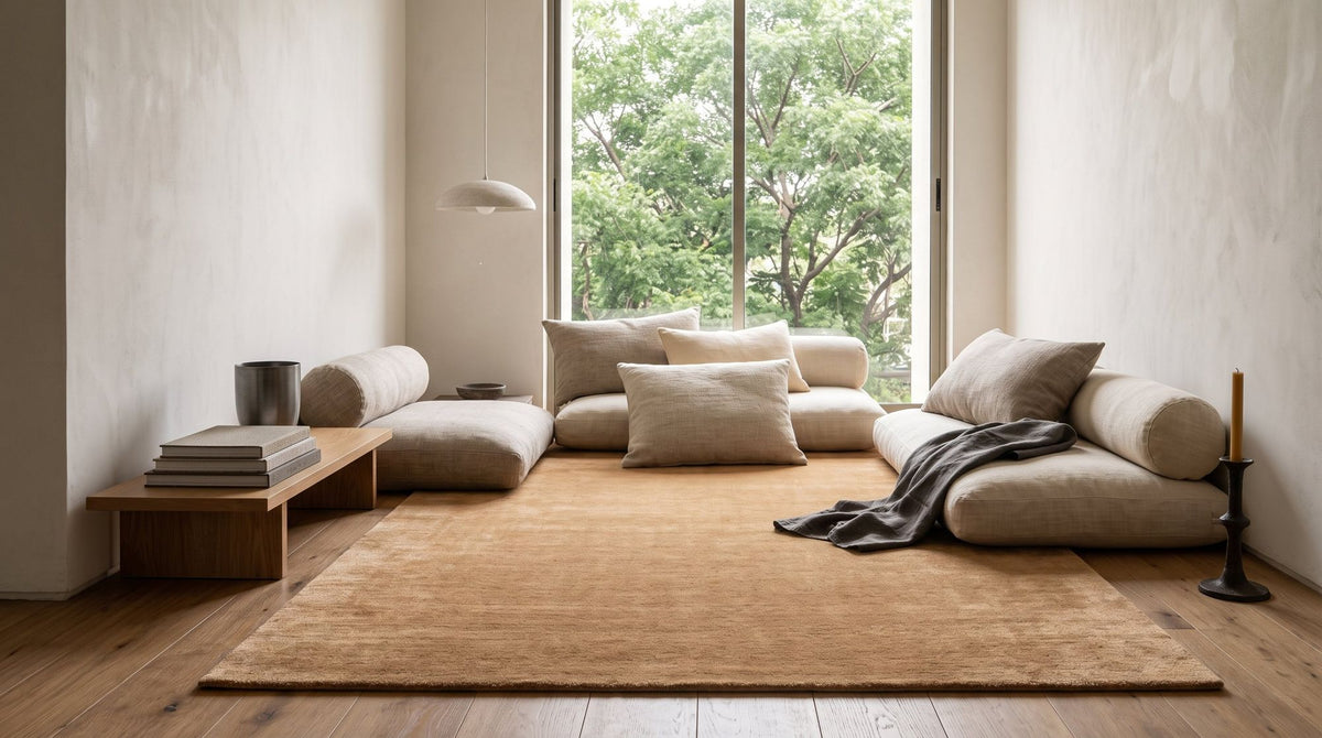 Plush Wool Rug in camel in a styled living room, handloom wool with a deep, quiet pile.