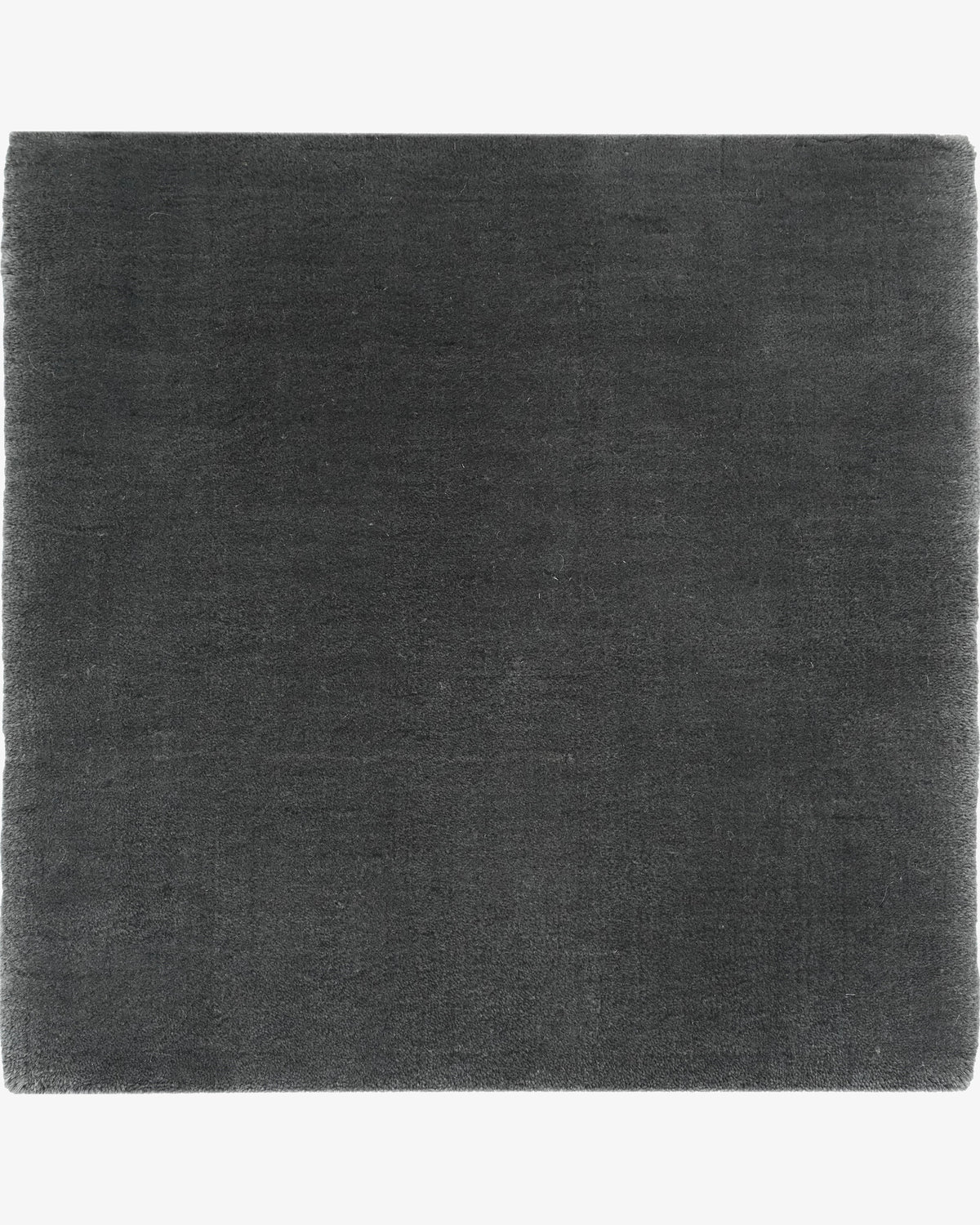Merino Suede in Charcoal, a Rugberry Reserve rug woven on the handloom in merino wool, made entirely to measure