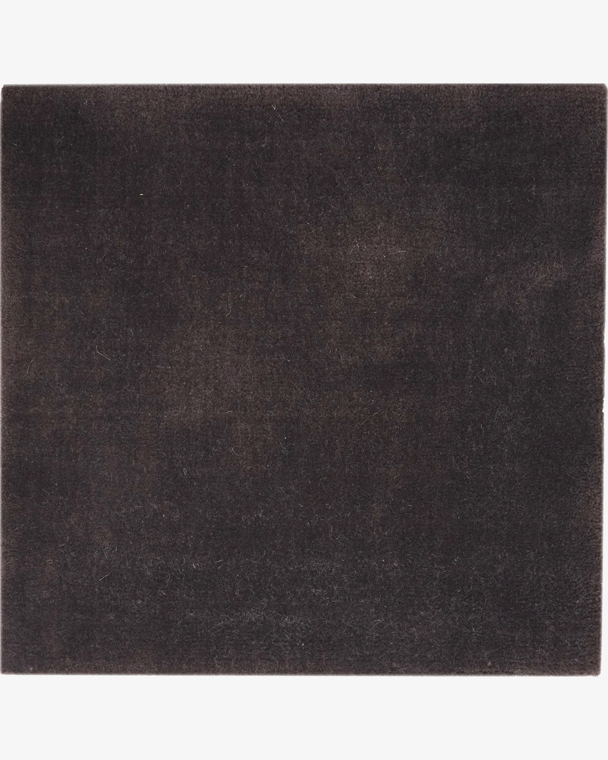 Merino Suede in Chocolate, a Rugberry Reserve rug woven on the handloom in merino wool, made entirely to measure