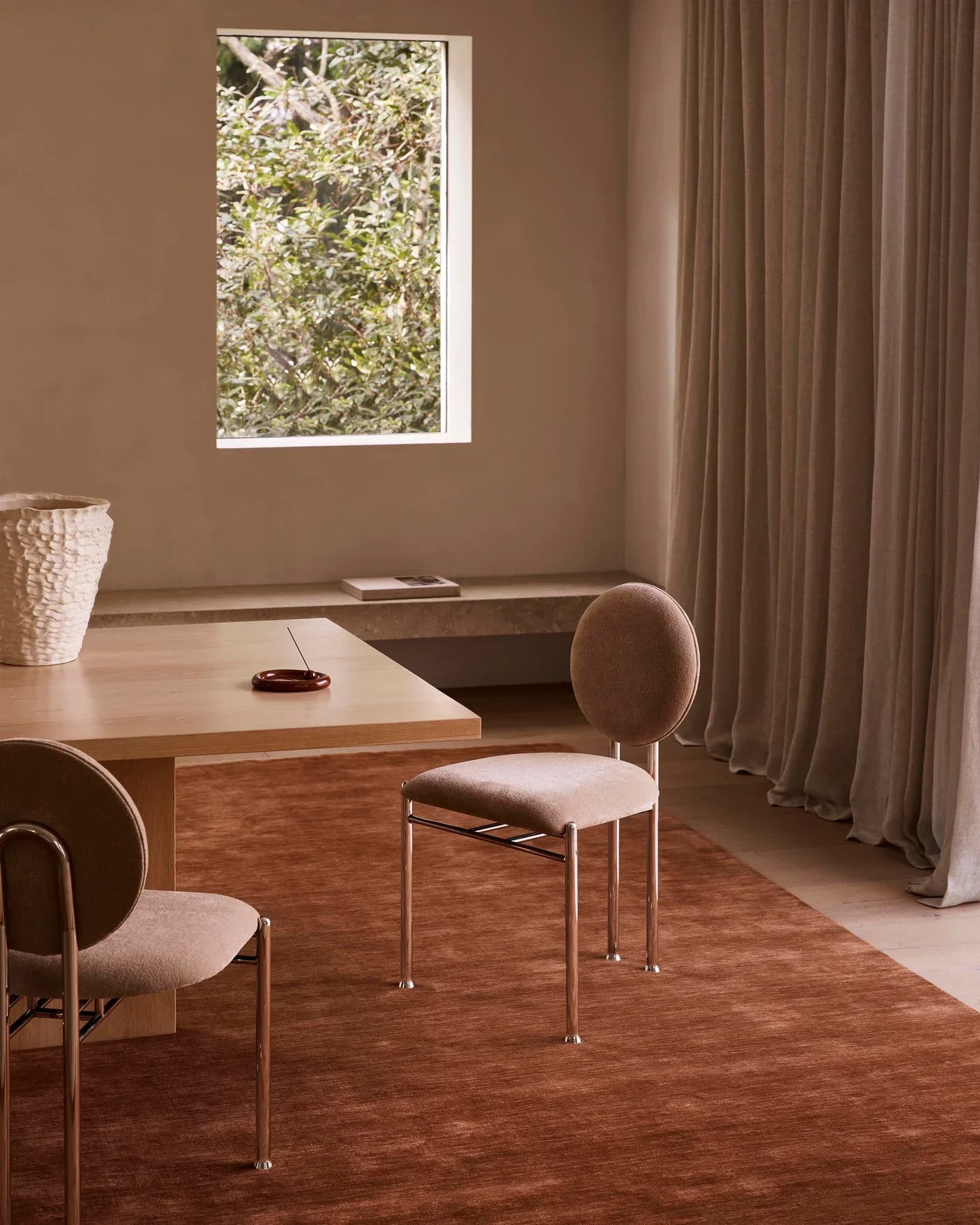 Handcrafted Rugberry rug in natural fibre styled in a contemporary interior