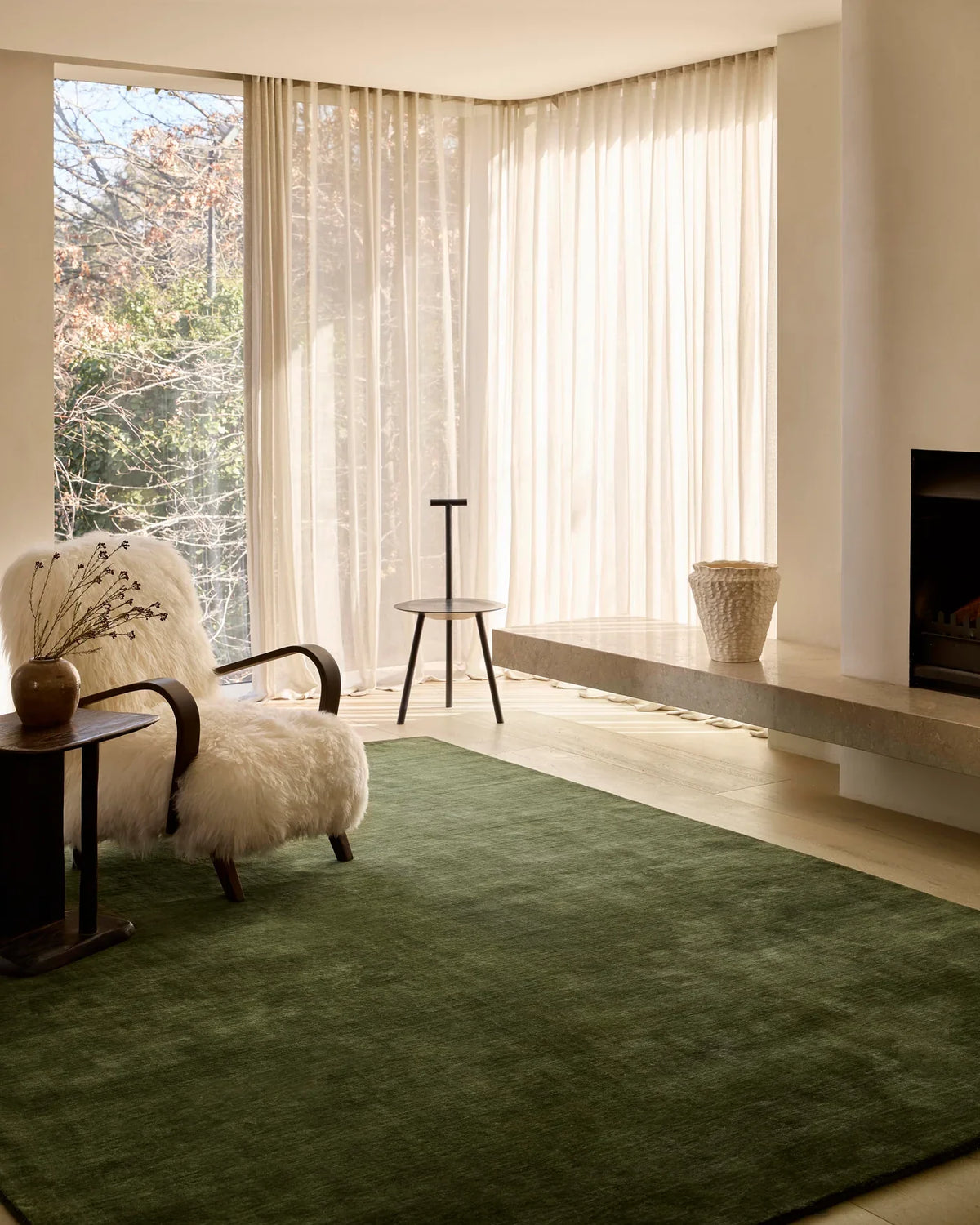 A handmade Rugberry wool rug photographed in an interior setting, from the Milk and Sugar lifestyle shoot