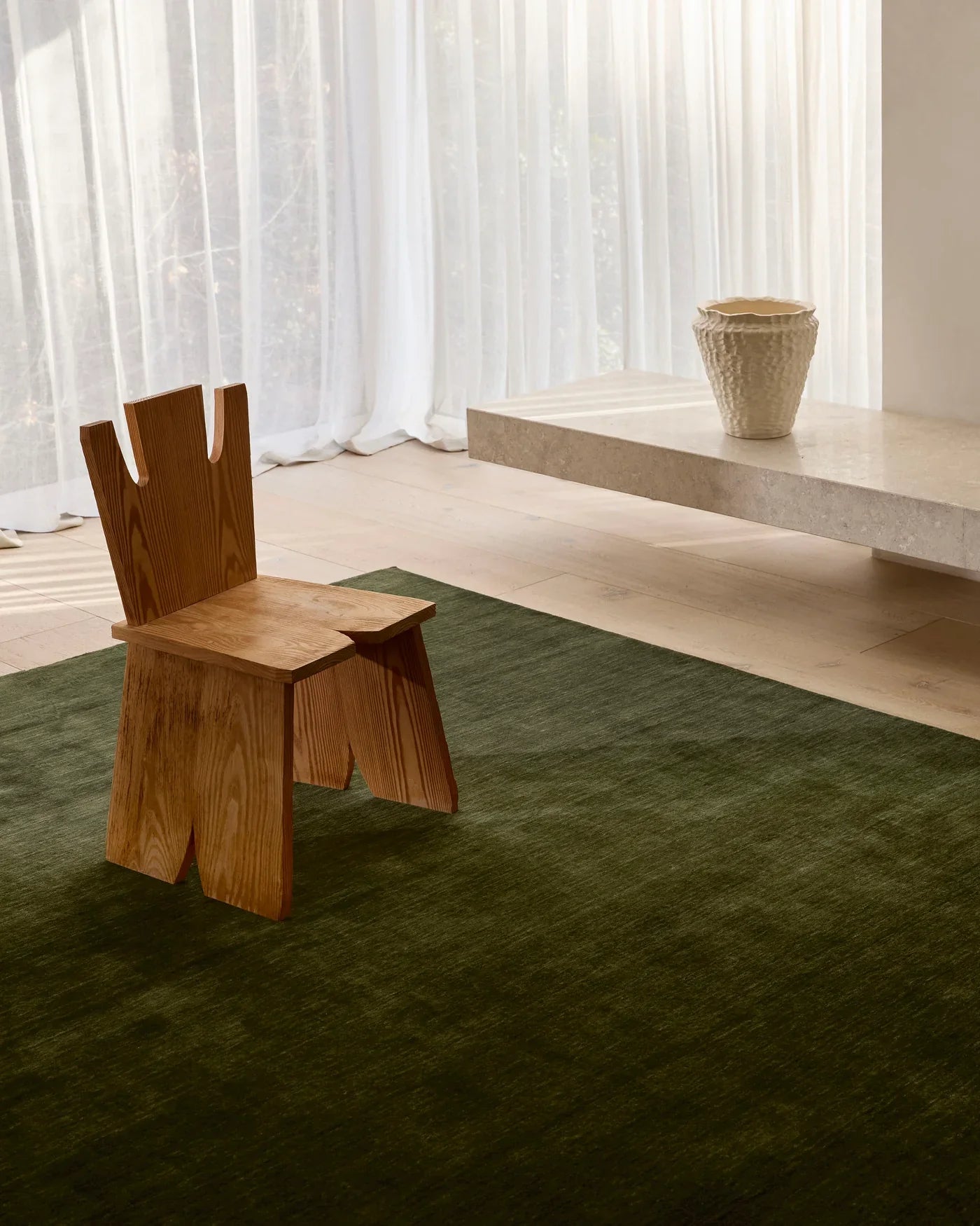 Handcrafted Rugberry rug made to measure, styled in a contemporary interior