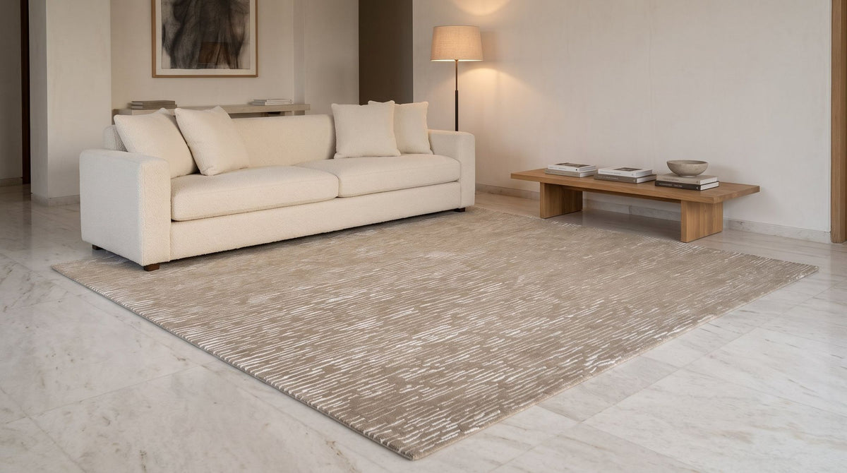 Cabella Wool & Silk Rug in Latte in a living room, hand tufted wool and silk.