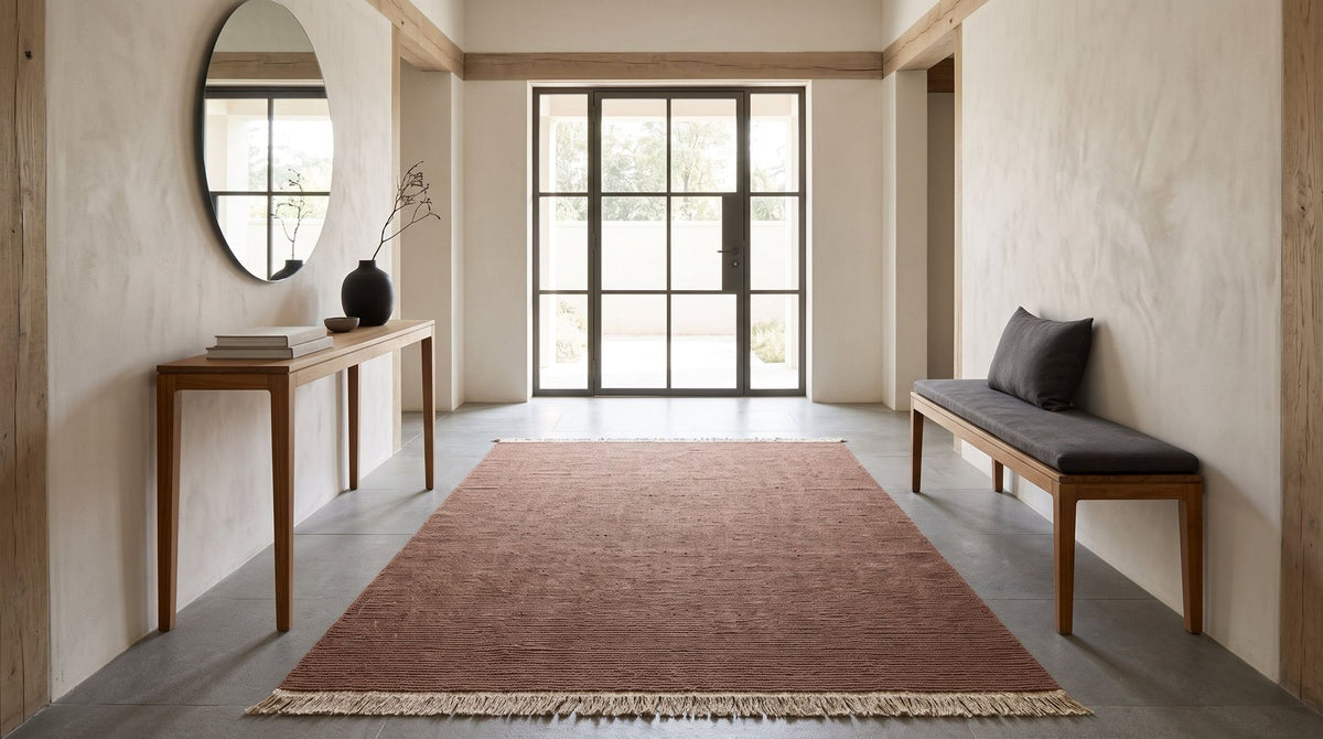 Cabra Wool & Jute Rug in Rust in a styled entrance foyer, handloom wool and jute.