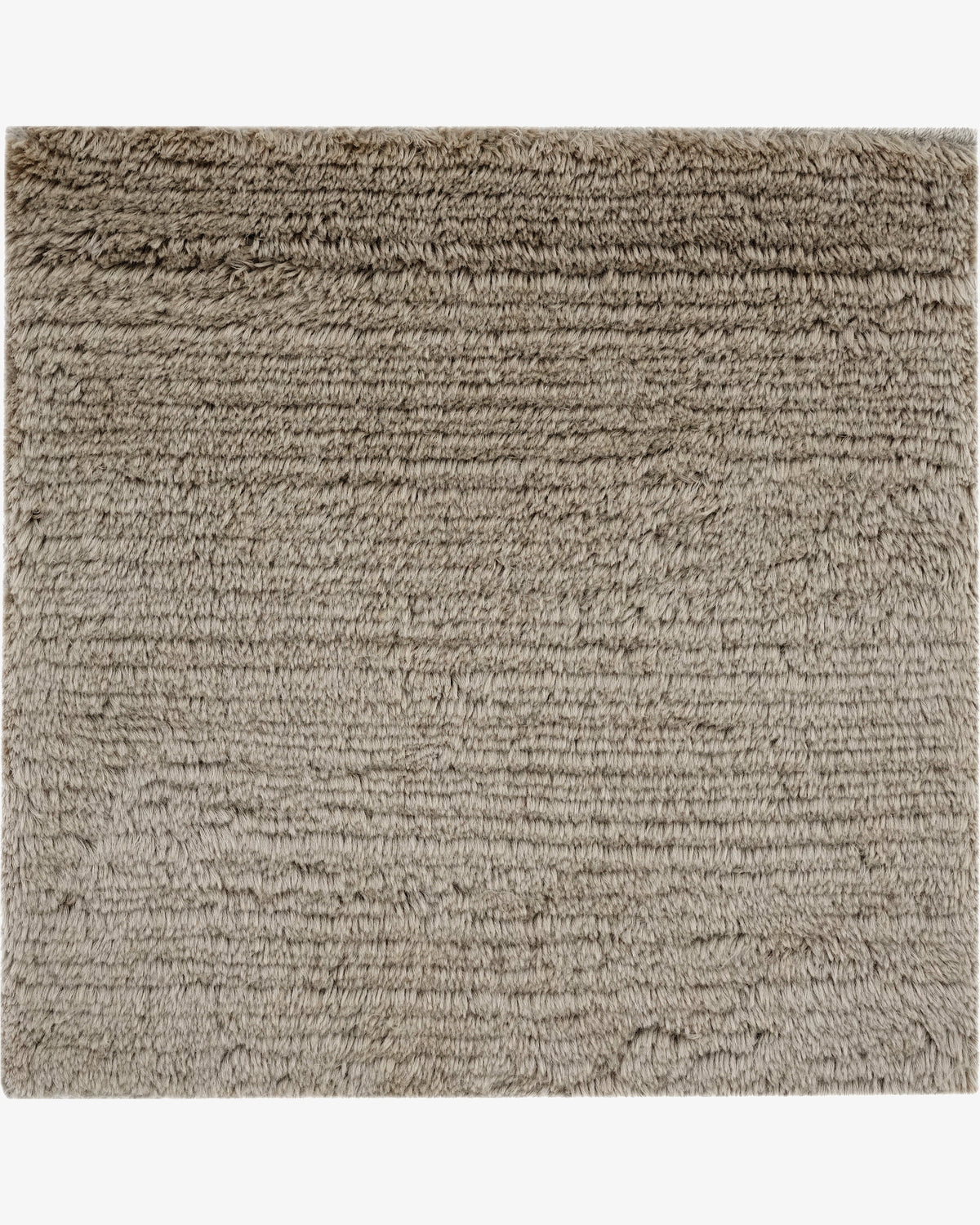 Merino Stria in Latte, a Rugberry Reserve rug hand-knotted in merino wool, made entirely to measure